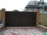 Приводи для розпашних воріт